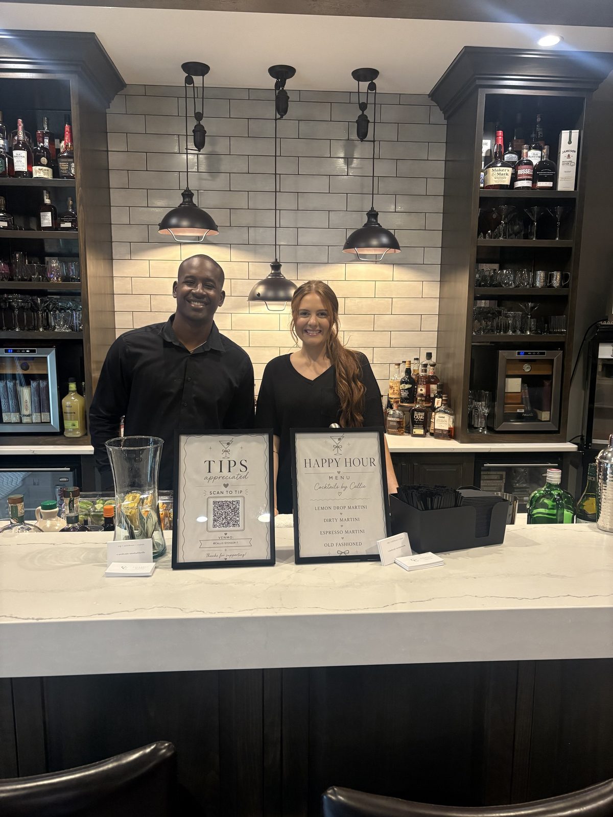 Happy hour menu and bartenders at a private residence bar