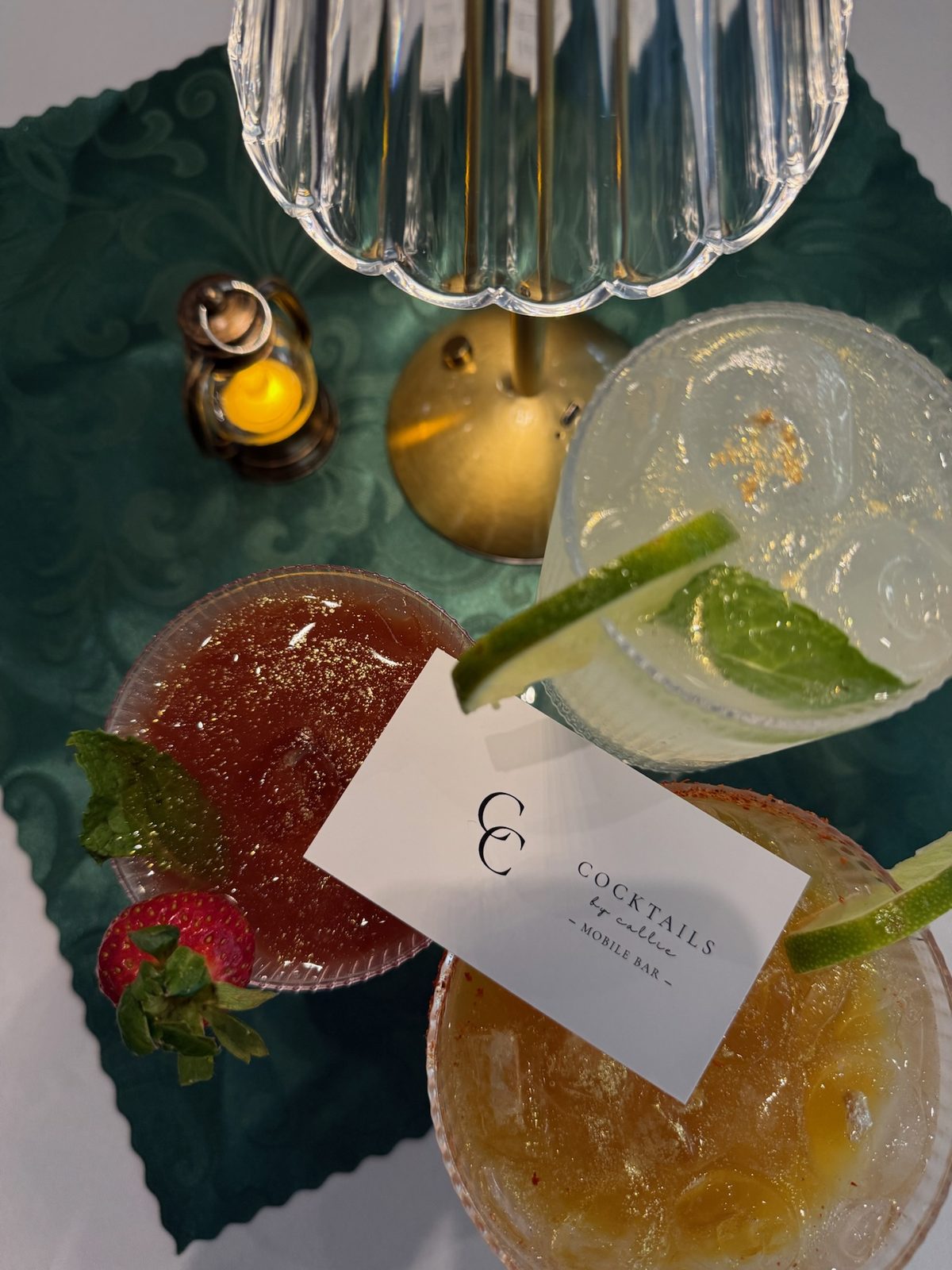 Three signature cocktails with a Cocktails by Callie card