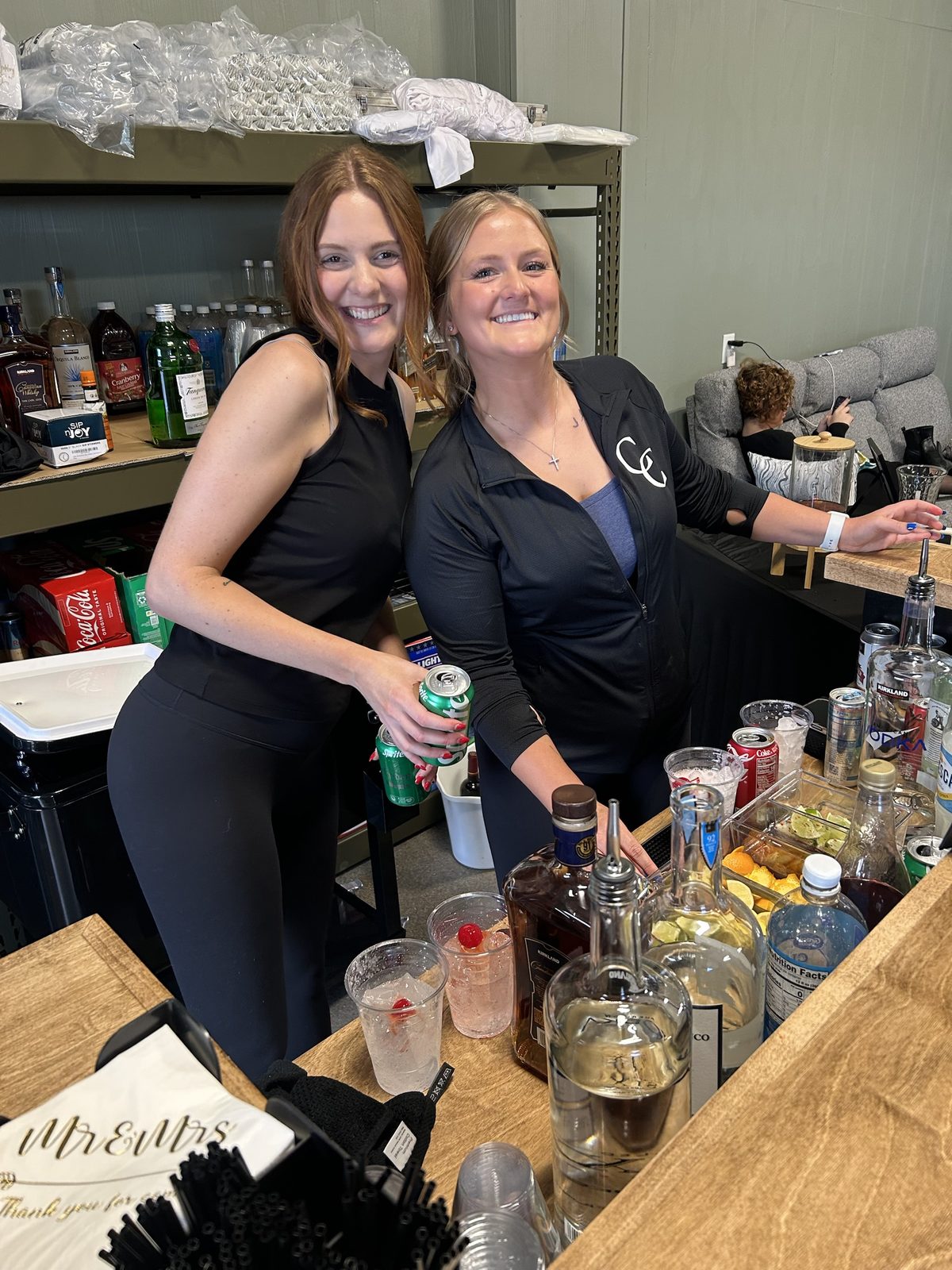 Bartenders serving at a wedding reception